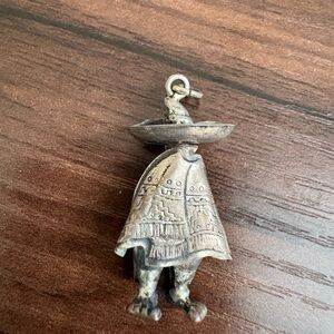 Silver Tone Figurine Pendant